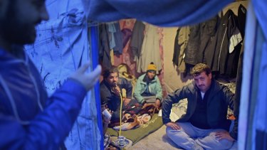Migrants in a Calais camp are enduring a long, cold winter in makeshift shelters.  