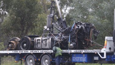 The destroyed remains of a vehicle after the fiery crash on the M7. 