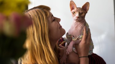 Student Anna Free with Dobby, a sphynx cat, who was desexed as a young kitten. 