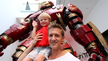 Nicolas Pougnet and son Lucas, 4, visit the Marvel exhibition at GOMA.