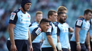 Tough times: Israel Folau and the Waratahs look dejected as the Crusaders pile on the tries.