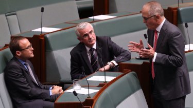 Data retention laws approved by lower house: Communications Minister Malcolm Turnbull talks with crossbenchers Adam Bandt and Andrew Wilkie.