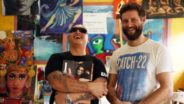 Artist Ben Quilty (right) has called for Sydneysiders to attend a candlelight vigil for Andrew Chan (left) and fellow drug trafficker Myuran Sukumaran (not pictured).