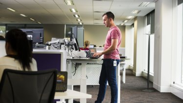 Standing desks may not be the answer.