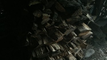 The woodpile in the home of Enja who was murdered by her brother-in-law Atmos for allegedly being a sorceress.