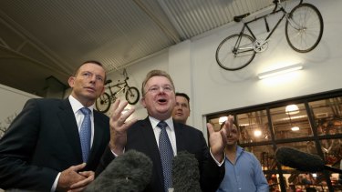 Mr Billson with then prime minister Tony Abbott during a visit to Celestino Cafe in Fyshwick, Canberra.