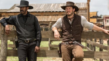 Chris Pratt, right, and Denzel Washington in Antoine Fuqua's remake of <i>The Magnificent Seven</i>.
