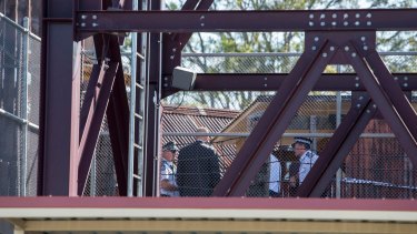 Police continued to examine the scene at Dreamworld on Wednesday.