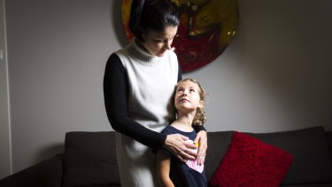 Simone Cariss with her six-year-old daughter Asha. Simone is petitioning for Asha to be able to wear pants as part of her school uniform. 