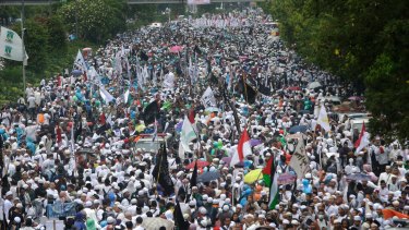 Indonesian Muslims march during a rally against Ahok on Friday. 