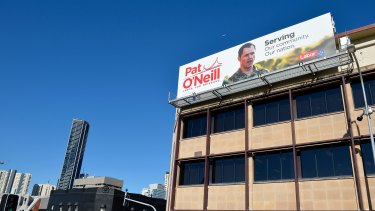 Labor candidate Pat O'Neill's billboard, on St Paul's Terrace, will be removed along by Saturday night.