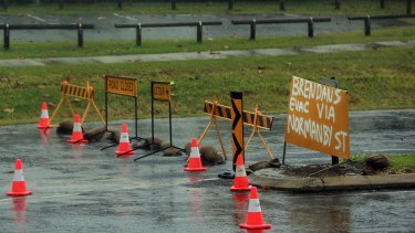 A police road block is set up as Tropical Cyclone Marcia hit the coastal town of Yeppoon.