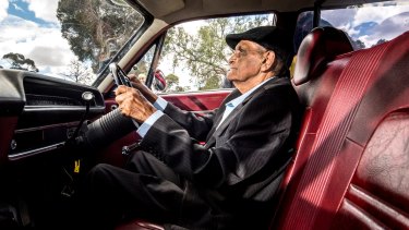 Uncle Herb Patten, who used to drive the hearse for the Aboriginal Funeral Service, gets behind the wheel again to help transport the remains of people including Mungo Man.