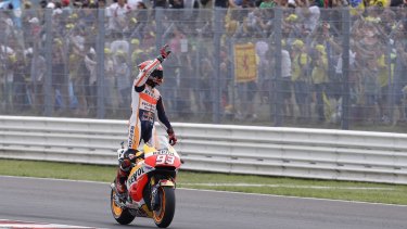 Honda rider, Marc Marquez of Spain, celebrates after winning the San Marino MotoGP on Sunday.