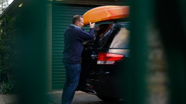 Tony Abbott packs a car before he and Margie leave Kirribilli House for the last time on Friday.