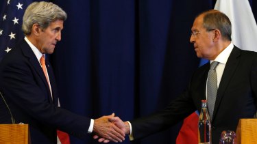 Fragile agreement: US Secretary of State John Kerry, left, and Russian Foreign Minister Sergei Lavrov agree on a Syria truce, in Geneva.