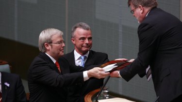 Prime minister Kevin Rudd and opposition leader Brendan Nelson deliver the official apology to the stolen generations to the House of Representatives speaker in 2008.