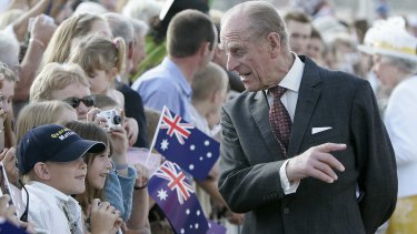 The Duke of Edinburgh chats with children after his arrival at Fairburn Air Force Base in Canberra in 2006. In 1970, the duke,  on being greeted in Greek, allegedly replied with a rude word in the same language.