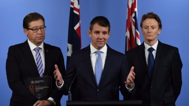 Mike Baird, flanked by Deputy Premier Troy Grant and RSCPA NSW CEO Steve Coleman, announces greyhound racing will be shut down in NSW.