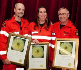 Logan bravery awards given to (left to right) Chris Holloway, Claire Browning and Jim Ferguson from the SES.