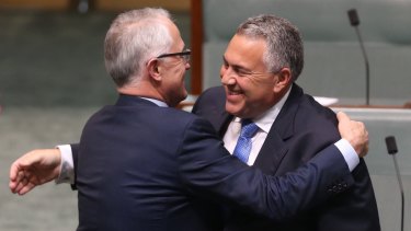 Prime Minister Turnbull embraces former treasurer Joe Hockey after his valedictory speech on Wednesday.