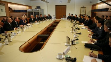 Turnbull government ministers meet with the Chinese delegation in the cabinet room at Parliament House in March.