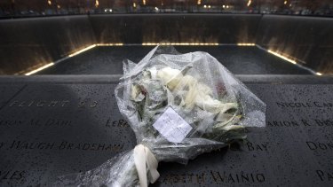 A bouquet left by the Duke and Duchess of Cambridge at the September 11 Memorial's Reflection Pool in New York on December 9, 2014. The CIA's torture program had its genesis in the response to the terrorist attacks of September 11, 2001. 