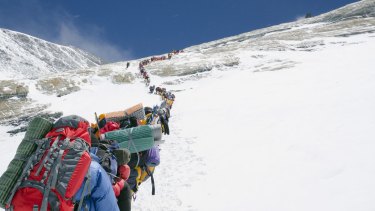 A line of climbers on the Lhotse Face, Mount Everest.