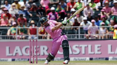 A.B. de Villiers hits a boundary during his record-breaking innings in Johannesburg on Sunday.