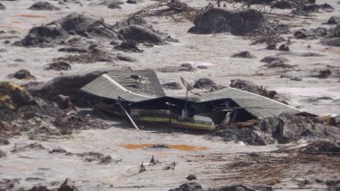A farmhouse buried in mud in Bento Rodrigues after the BHP-Vale Samarco dam failure. 