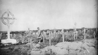 A cemetery near Pozieres, showing Australian and German graves side by side.