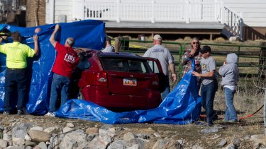 Police recover the vehicle from the Spanish Fork River in Utah. 