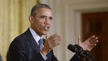 US President Barack Obama has rallied Democratic support for the Iran nuclear deal, securing the support of 34 senators to ensure a veto would be sustained on congressional resolutions to block it.