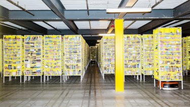 A robot fills orders inside an Amazon fulfilment centre in the US.