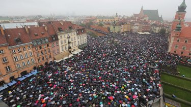 A sea of umbrellas on Black Monday in downtown Castle Square, Warsaw.