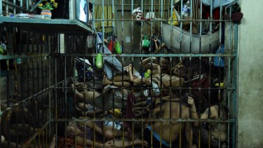 Prisoners inside a cell in Manila Police Headquarters, Philippines, most arrested  under tough drug laws.