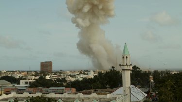 Smoke billows from the Jazeera hotel during an attack in Somalia's capital Mogadishu on Sunday.