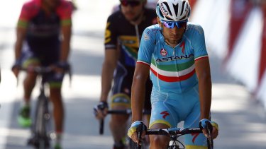Vincenzo Nibali rolls across the stage six finish line after crash.