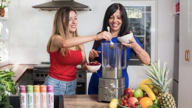 Smoothie Bomb started in Cinzia Cozzolino's (right) kitchen and she enlisted her daughter Lana Hooper (left) to help out. 