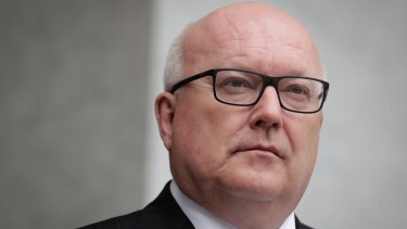 Attorney-General George Brandis announces the proposed foreign interference laws in Canberra.