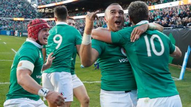 Stunning: Ireland celebrate after scoring against the All Blacks.