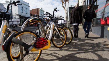 oBikes seen on Swan Street in Richmond, which is now home to "hundreds" of the distinctive bikes, according to locals.