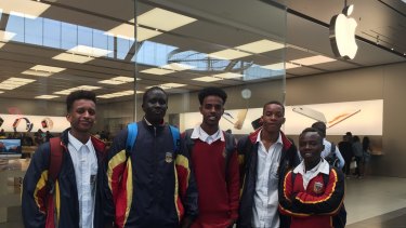 Students Petrie Alemu, Mabior Ater, Mihamed Semra, Ese Oseghale and Gereng Dere go to Apple at Highpoint Shopping Centre for the store's apology.