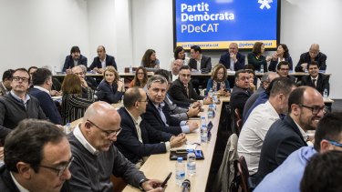 Members of the Catalan Democratic Party committee meet in Barcelona on Monday.