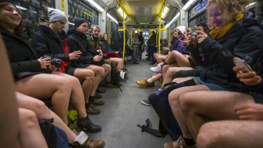People take part in the annual "No Trousers On The Tube Day" event in Berlin. 