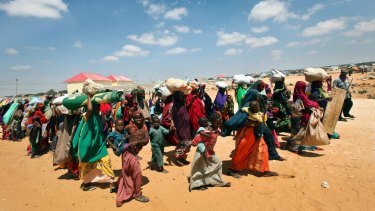 Families internally displaced by drought arrive at makeshift camps in the Tabelaha area on the outskirts of Mogadishu, Somalia.