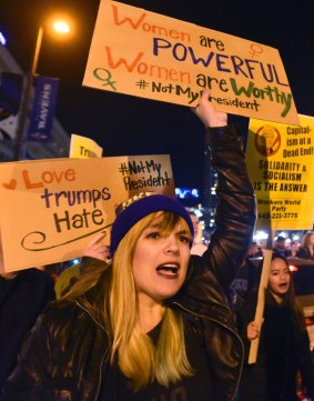 Anti-Trump protesters march from the Washington Monument to Inner Harbor in Baltimore. 