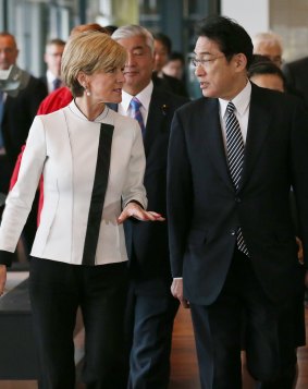 Julie Bishop and Fumio Kishida at the Royal Australian Navy Heritage Centre in November, with Japanese Defence Minister Gen Nakatani seen between them in the background.