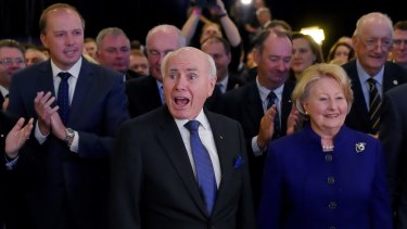 Former prime minister John Howard, pictured with wife Janet, appeared to enjoy the launch more than Tony Abbott.