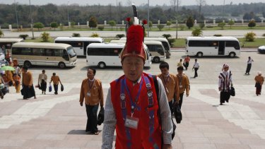 An ethnic Naga lawmaker of the National League for Democracy party arrives at parliament on Monday.